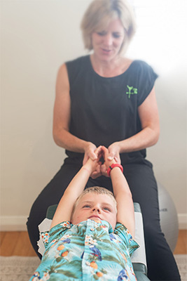 Chiropractor Porirua NZ Roz Griffiths Adjusting Kid